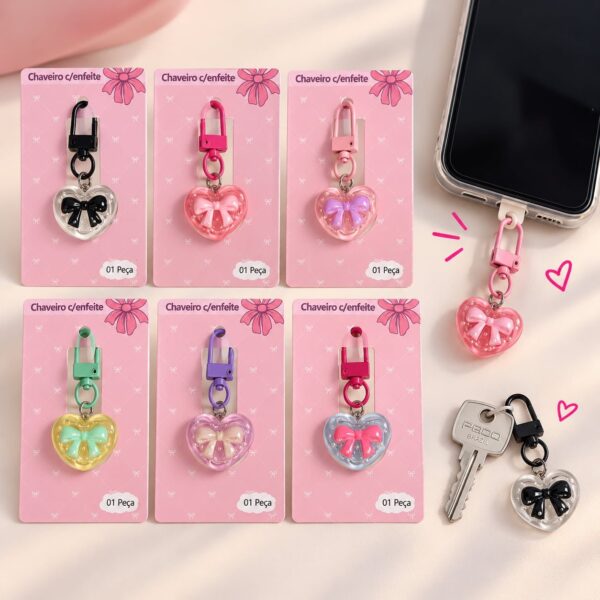 Chaveiro Tendência Charm p/ Celular Coração Laço - IMPORTADO - UND